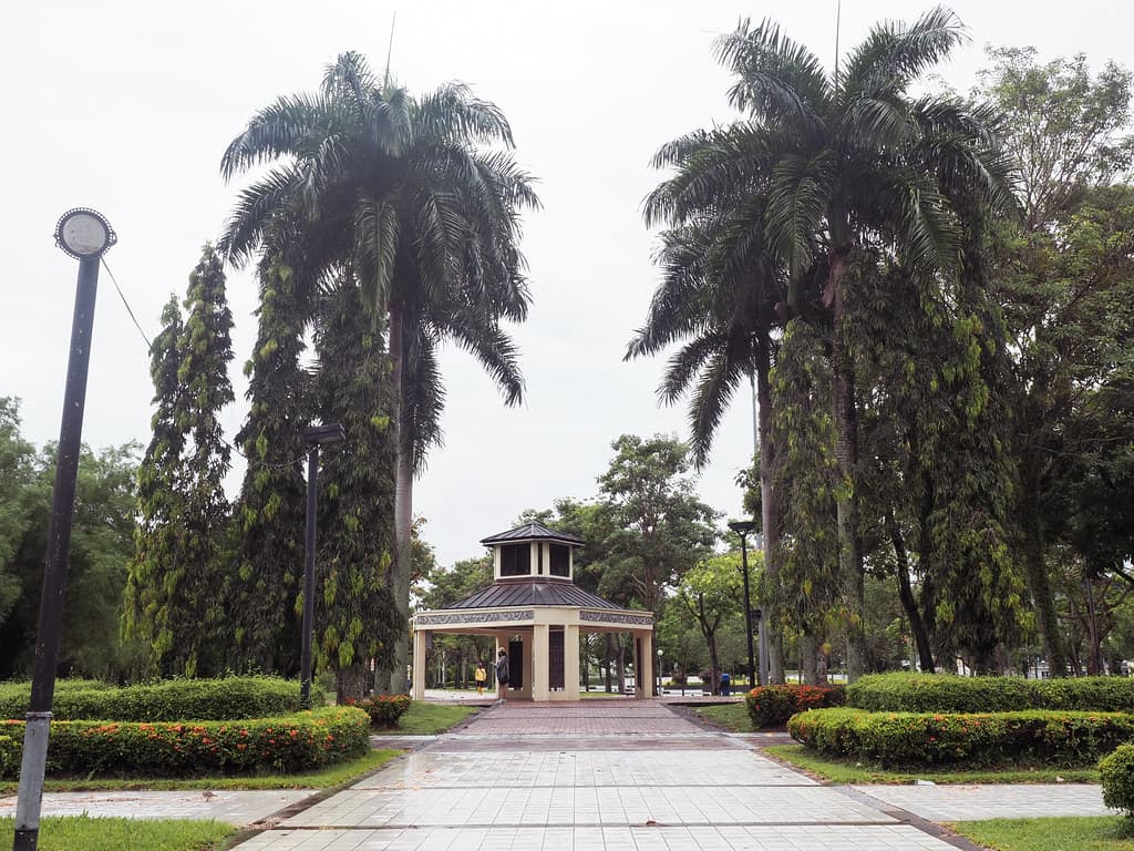 Palm-lined path leading to the pavilion at Miri City Fan